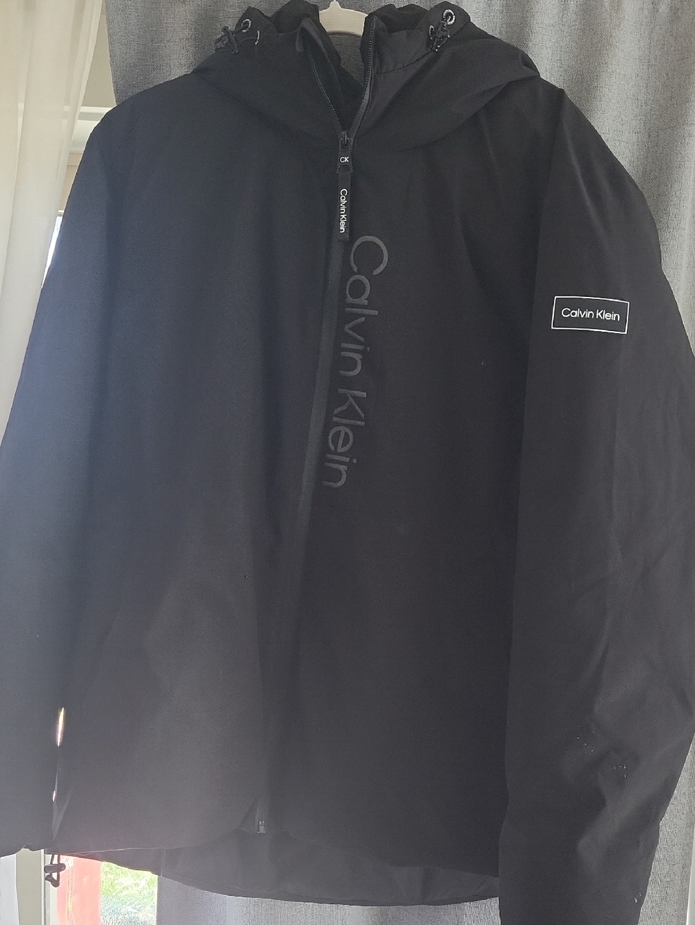 Calvin Klein Men's Black Hooded Raincoat with Subtle Logo